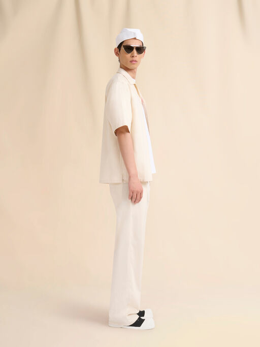 Cream denim wide-leg jeans with Trunkaroo plaque - Pants